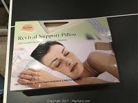 Boxed Revival Support Pillow with image of sleeping woman and product information.