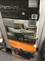 Box of the PremAire airbed by Intex, showing product name, fiber-tech construction, and queen size.
