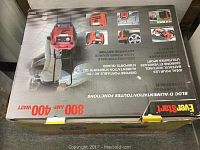 Photo of the closed box packaging showing EverStart branding and product capacity details of 800 Amp and 400 Watt output with images of the powerpack unit.