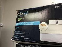Box showing Beautyrest branding and queen size dimensions.