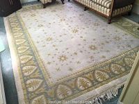 Full view of rug beneath furniture showing overall pattern and scale