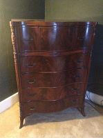 Full frontal view of five-drawer highboy dresser