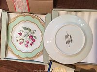 Dessert plates showing floral design and backstamp