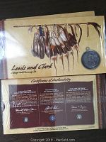 Presentation folder front with “Lewis and Clark Coinage and Currency Set” title and medallion illustration