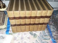Front view of the seven volumes designed as antique books titled 'History of Nations' packed closely together.