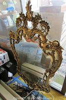 Full front view of mirror showing overall shape and design