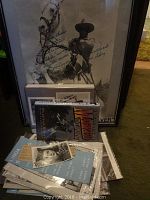 Framed signed black and white photo of Clayton Moore as The Lone Ranger on horse Silver with signatures and personalized message, plus book and vintage magazines about Clayton Moore and Linda Stirling beneath.