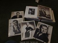 Six vintage 8x10 black and white celebrity photos laid out, showing various celebrities including Janice Harper, Jerry Keller, and Hugo Winterhalter, some in plastic frames.