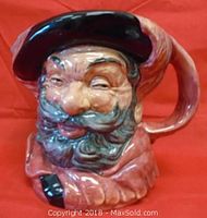 Front view of Royal Doulton Falstaff Toby Jug showing detailed facial features and hat.