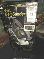 Front of original box for Craftsman 4 inch belt sander model 911792, showing sander image, 1.25 HP motor, and key features