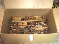 Box of assorted wooden planes and tools viewed from above