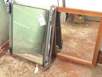Two mirrors side by side: one vintage medicine cabinet mirror with chrome edges and a wood framed rectangular mirror