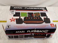 Closed box of Atari Flashback 2+ showing graphics and branding