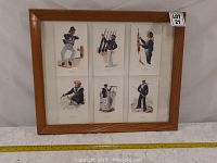 Full view of wood framed collection of six vintage naval postal cards under glass.