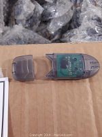 Close-up image of a single USB key with the cap removed, showing the circuit board inside a clear plastic casing.