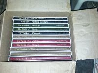 Box containing 10 hardcover Time Life art books in individual sleeves. Titles visible include Marcel Duchamp, American Painting 1900-1970, Van Gogh, Turner, Picasso, Rubens, Giotto, Bruegel, Watteau.