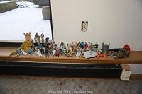 Overall view of figures and vehicles on shelf