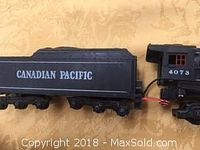 Close-up of Canadian Pacific Mantura HO #4073 Engine and coal car with visible details such as the number 4073 and Canadian Pacific lettering.