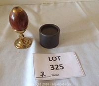 Nicholas II style wooden egg kaleidoscope with brass top and stand, cylindrical protective case, and lot card.