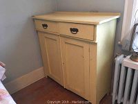 Front view of painted sideboard closed showing two drawers over two doors