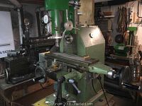 Front view showing milling table, handwheels and head