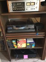 Overview showing Sony cassette deck, stereo preamp, Sony turntable, and Kenwood CD player along with CDs.