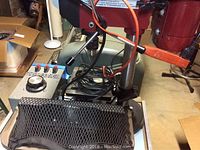 Northern 5-speed drill press unit, showing part of the drill head and cord.