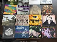 Image of 18 assorted CD covers including titles such as 'Gramercy Riffs', 'Sweet Thing', 'Jesse Malin & The St. Marks Social', 'Twin Forks'