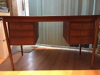 Front view showing overall desk and all six drawers