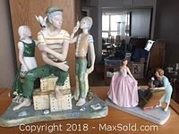 Wide view of three porcelain figurines including the Ingles sailor figure with children and dove, and the Norman Rockwell themed figurines of woman and piano player.