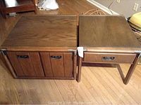 Two wooden Kroehler side tables placed together, one cabinet style with double doors, one smaller end table with drawer.