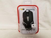 Front view of the Case Logic wireless optical gaming mouse in sealed packaging.