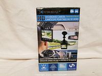 Photo showing the front of the boxed XTreme HD dashboard camera with image of the camera installed on the windshield, LCD screen in use and highlighted features like HD recording and 270° adjustability
