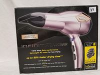 Front view of the boxed Infinity Pro Conair hair dryer with details of wattage and features