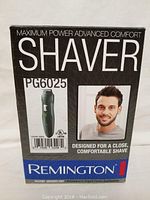 Front of the Remington PG6025 electric shaver box showing product image, model number, and branding.