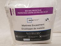 Front view of Mainstays mattress encasement packaging showing product name, queen size, and bed bug protection.