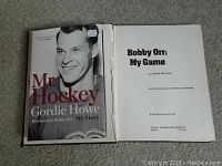 Photo of Mr. Hockey Gordie Howe My Story book with foreword by Bobby Orr and Bobby Orr: My Game book open inside