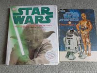 Two Star Wars books, 'Star Wars: The Complete Visual Dictionary' and 'The Star Wars Storybook' with characters Yoda, R2-D2, and C-3PO on covers.