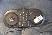 Full view of Ion Discover DJ Controller showing two jog wheels and central control interface