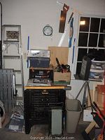 Overall view: Workmate ShopBox bench with Stack-On toolbox, Dremel box, hand saw, assorted tools
