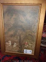 Full view of the framed artwork showing riders on horseback in a natural landscape.