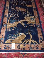 Full view of rug showing overall design and condition