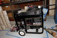 Side view of Generac PP5000T generator on wheels