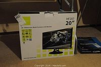 Photo of the Hannspree HF207 20 inch LCD monitor box showing model and specifications.