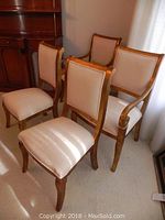 Four chairs grouped to show overall set configuration