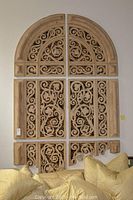 Full view of six resin panels installed above sofa.