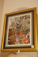 Full view of framed floral wall portrait with gold frame and double mat