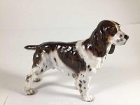 Side view of the Royal Doulton Springer Spaniel figurine showing detailed glossy glaze and coloration