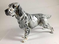 Front side view of the Royal Doulton English Setter dog figurine showing detailed fur texture and coloration.