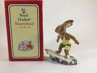 Front view of figurine with original Royal Doulton Bunnykins box.